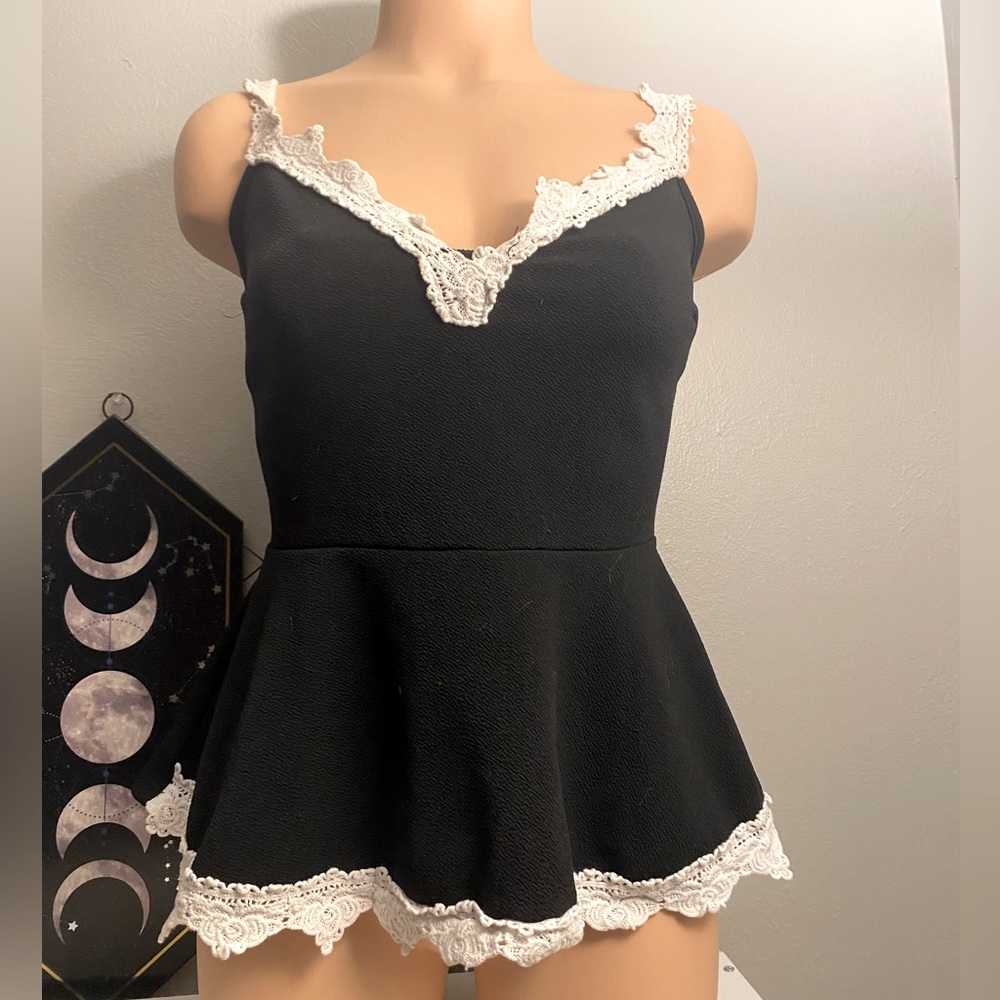 Black peplum tank top by style shop. Size S(?)